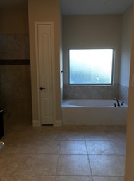 Master Bath Tub and Linen Closet