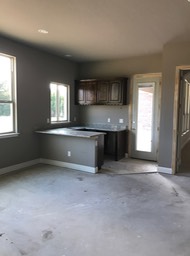 Media Room Looking Towards Patio Door and Wet Bar